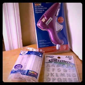 Glue gun, glu sticks, glittery ones ect